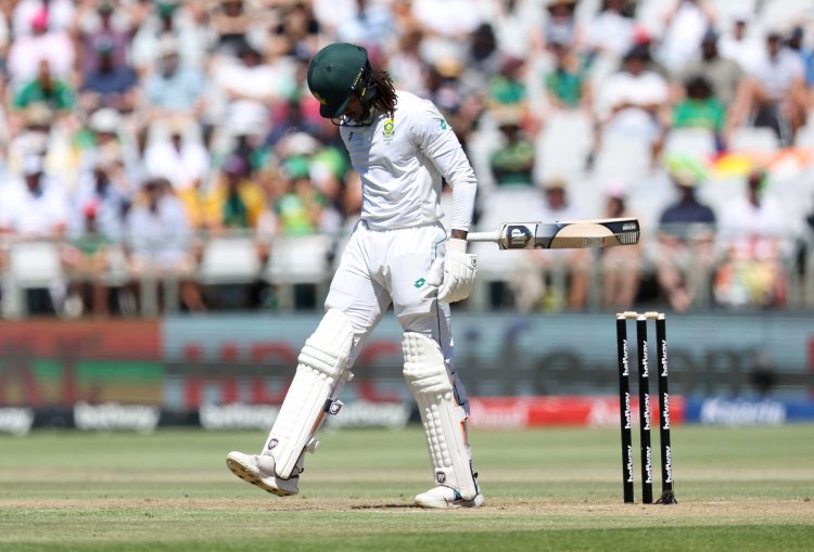 Cricket - Second Test - South Africa v India - Newlands Cricket Ground, Cape Town, South Africa - January 3, 2024 South Africa's Tony de Zorzi walks after losing his wicket, caught out by India's KL Rahul off the bowling of Mohammed Siraj REUTERS/Esa Alexander