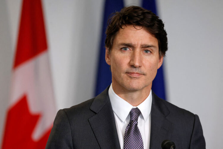 Canadian Prime Minister Justin Trudeau looks on during a press conference with French President Emmanuel Macron in Montreal, Canada, on September 26, 2024. (Photo by Ludovic MARIN / AFP) (Photo by LUDOVIC MARIN/AFP via Getty Images)